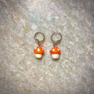 Orange mushroom clasp earrings